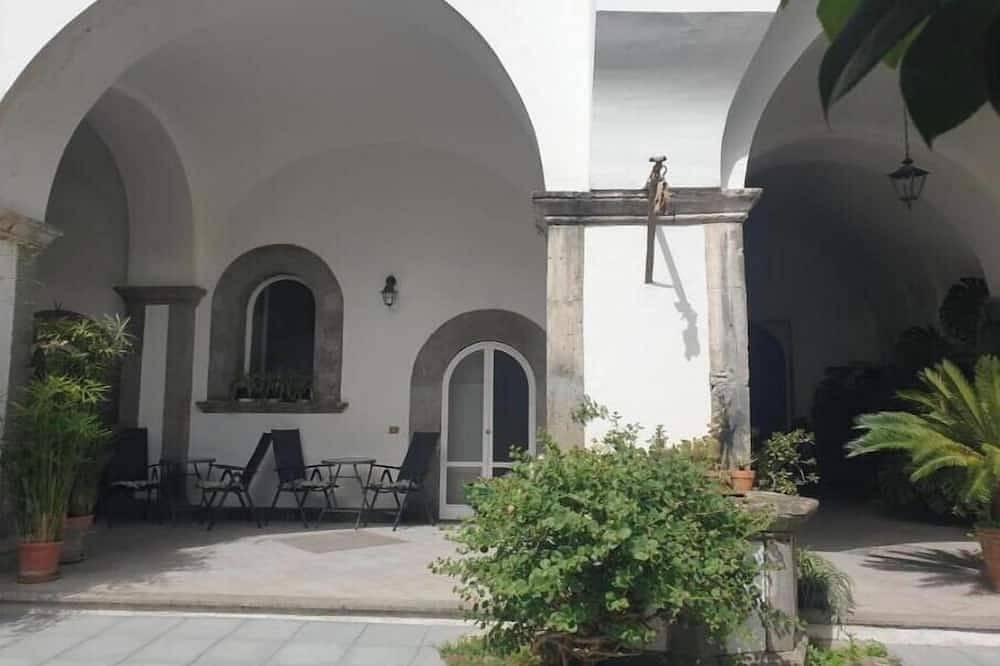 The House of Camellias | Elegant Double Room with Patio in Meta, Sorrento Coast