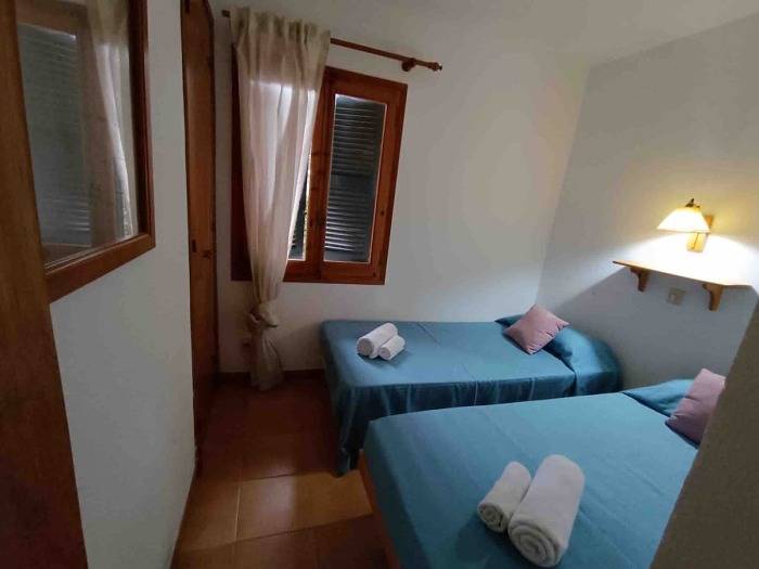 Apartamento vacacional entero, Apartamento · Arenal d'en Castell · 2 dormitorios · 3 camas · 1 baño in Arenal d'en Castell, Es Mercadal