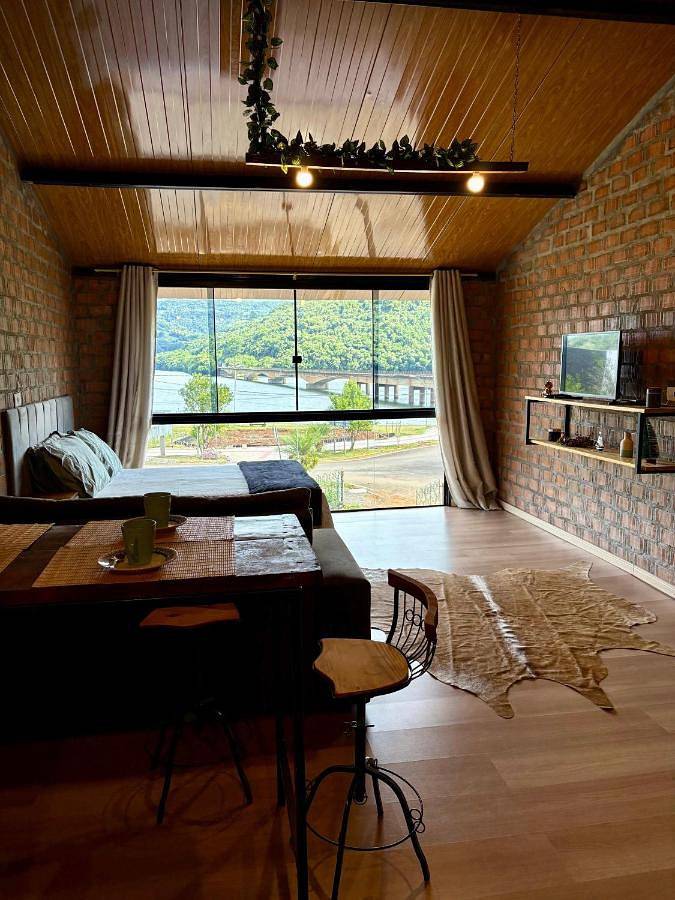 Appartement de vacances pour 3 personnes, avec vue ainsi que vue sur le lac et jardin