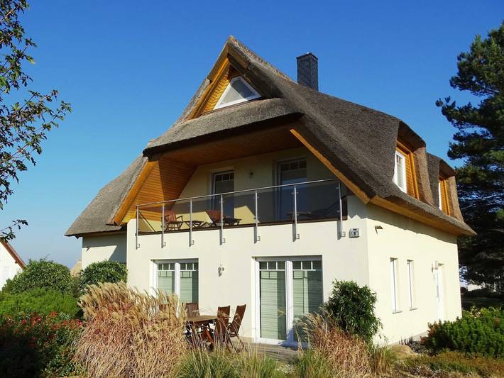 Ferienwohnung für 4 Personen, mit Garten und Seeblick, kinderfreundlich in Loddin
