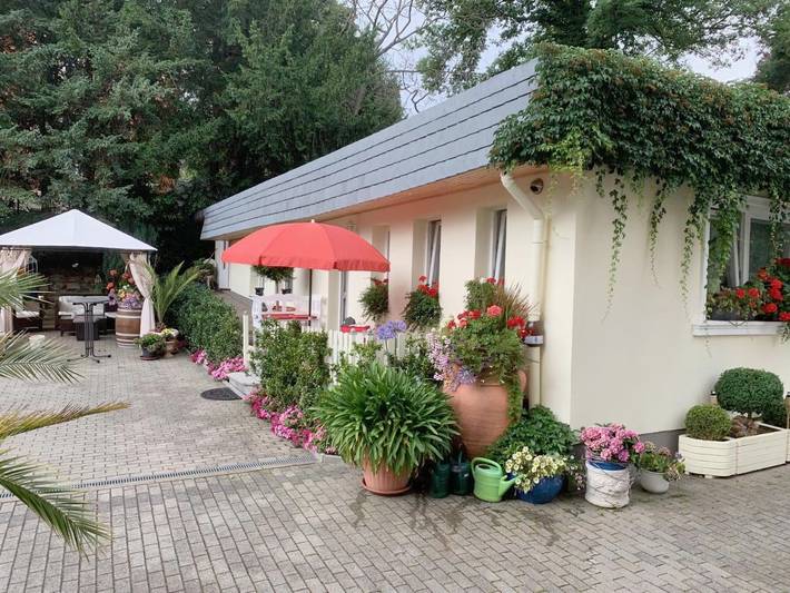 Ferienwohnung für 4 Personen, mit Balkon und Terrasse sowie Garten und Ausblick