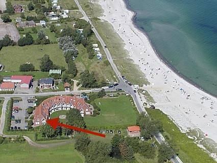 Ferienwohnung mit Meerblick für 4 Personen, mit Balkon und Garten sowie Pool und Sauna