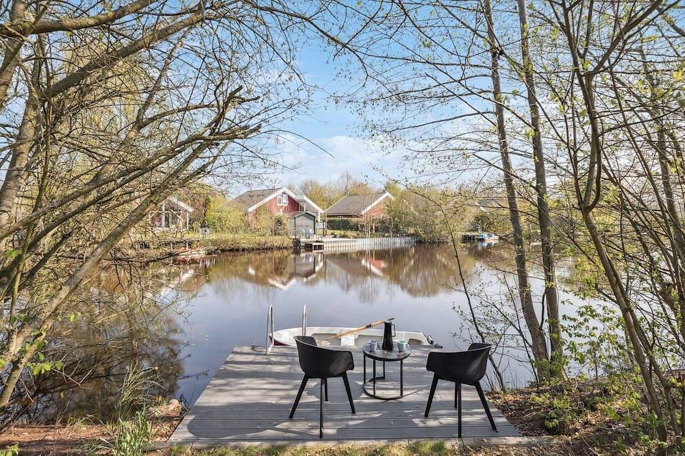Ferienhaus am kleinen See mit Steg und Garten in Twist, Emsland