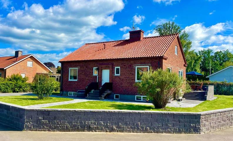 Ferienhaus für 6 Personen, mit Terrasse und Garten sowie Seeblick und Ausblick