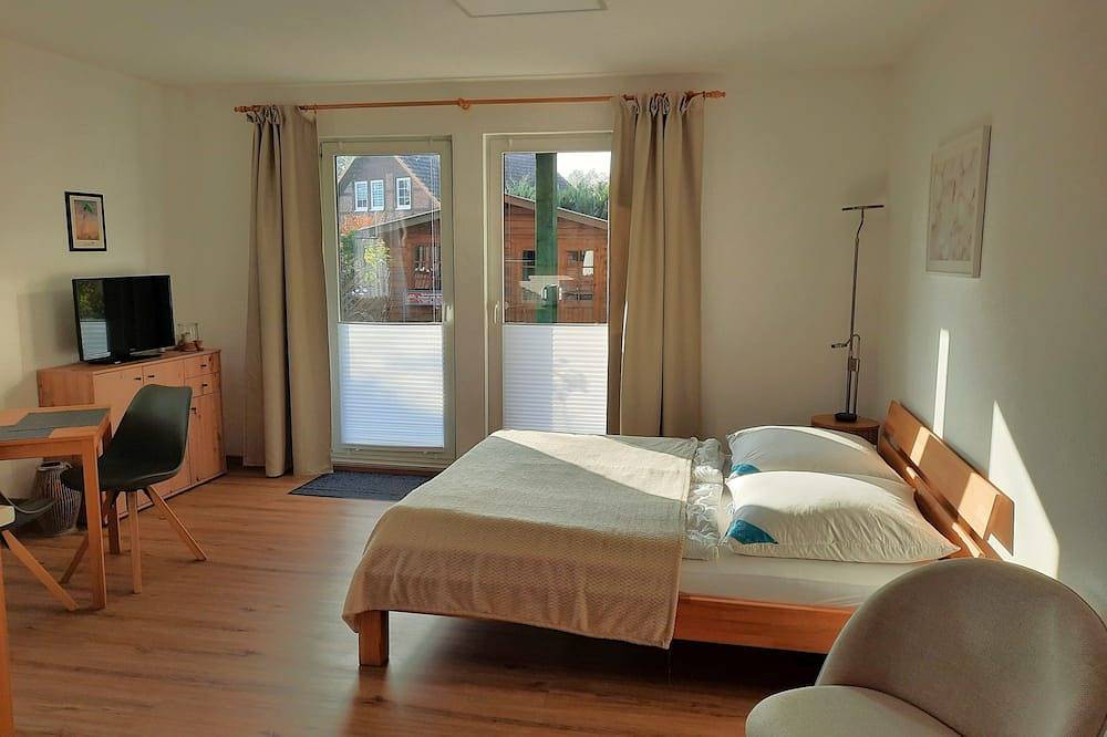 Ganze Wohnung, Ferienwohnung 2 - Ferienhaus Sasse Ferienwohnungen mit Garten & Grill in Mölschow, Usedomer Norden