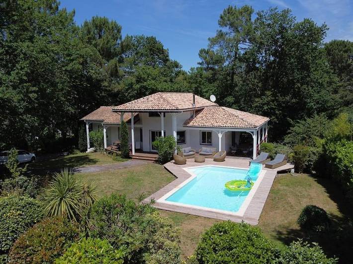 Cottage pour 8 personnes, avec jardin ainsi que piscine et vue dans Golf De Biscarrosse