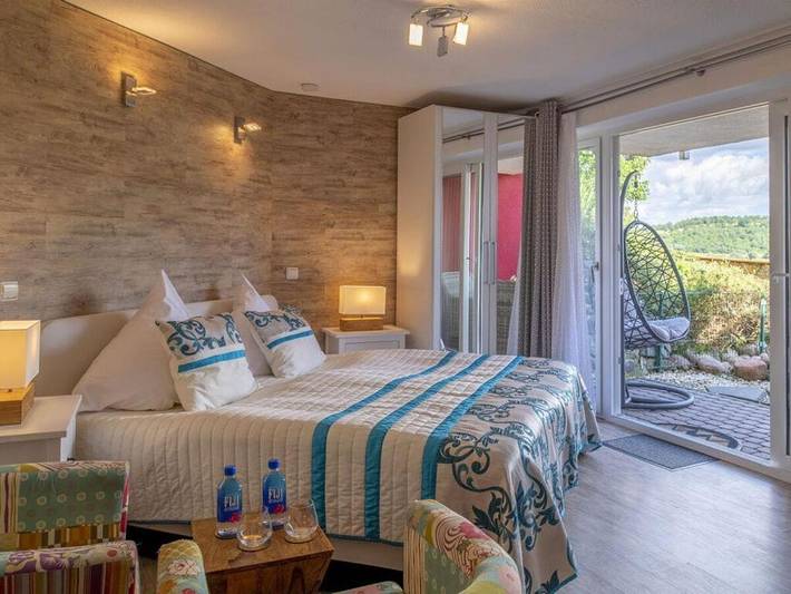 Ferienhaus für 2 Personen, mit Whirlpool und Terrasse sowie Garten und Sauna
