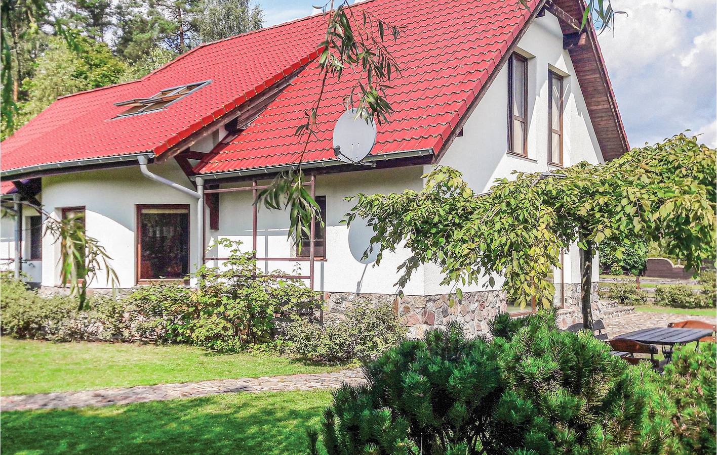 Ferienhaus für 8 Personen mit Terrasse in Powiat Olsztyński