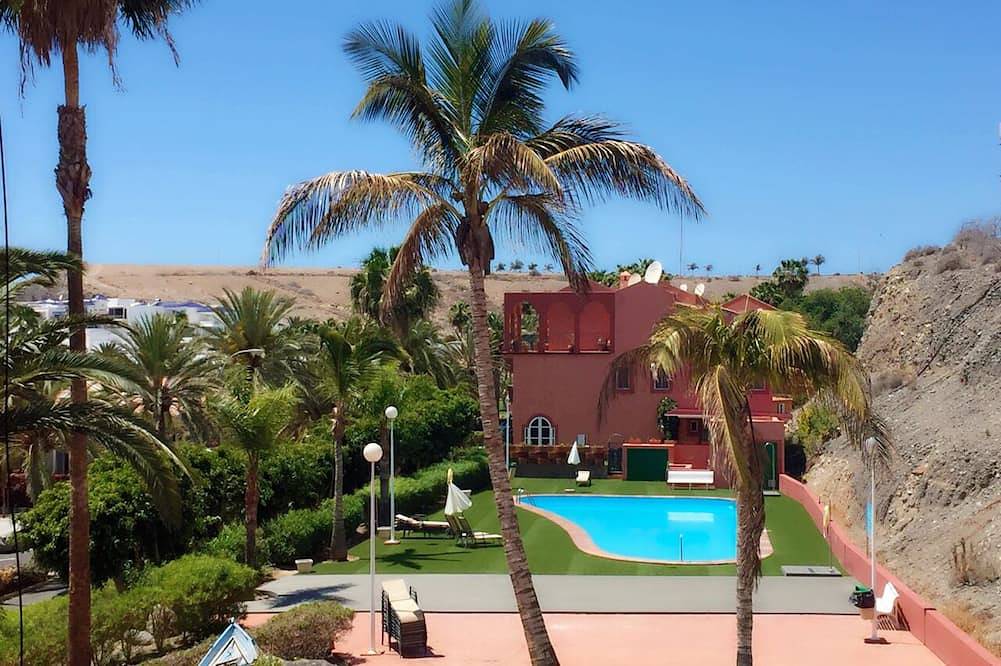 Pasito Blanco. Vista mar y puerto. Piscina Climatizada Privada in Maspalomas, San Bartolomé de Tirajana