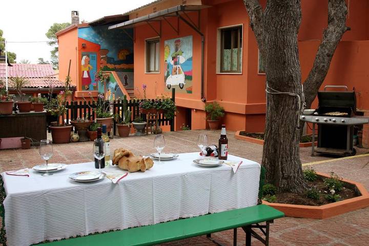 Casa vacanza per 5 persone, con Balcone e Terrazza nonché Giardino e Panorama nella Spiaggia di Porto Pino