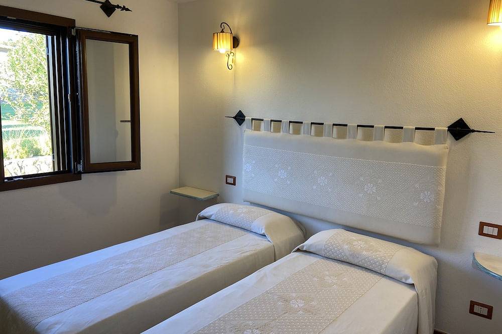 Casa Omar: Villa con Parco Giochi, Cucina Esterna e Ac – 900m dal Mare in Porto Ainu, Tanaunella