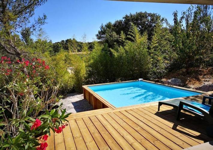 Appartement de vacances pour 5 personnes, avec piscine ainsi que jardin et terrasse