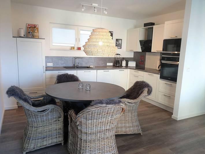 Ferienwohnung für 2 Personen, mit Balkon und Sauna sowie Ausblick in Schillig