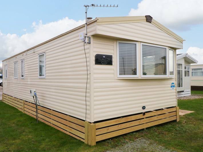 Caravan for 8 people, with garden in Lancashire
