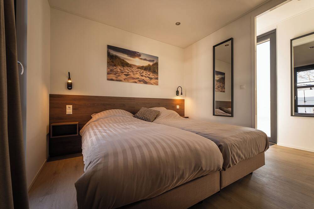 Luxuriöse Wellnessvilla für 4 Personen auf dem Anwesen Vogelenzang mit privater Sauna. Hell, komfortabel und nachhaltig eingerichtet, umgeben von Grün und in unmittelbarer Nähe zu den Dünen und der Küste. in Niederländische Nordsee