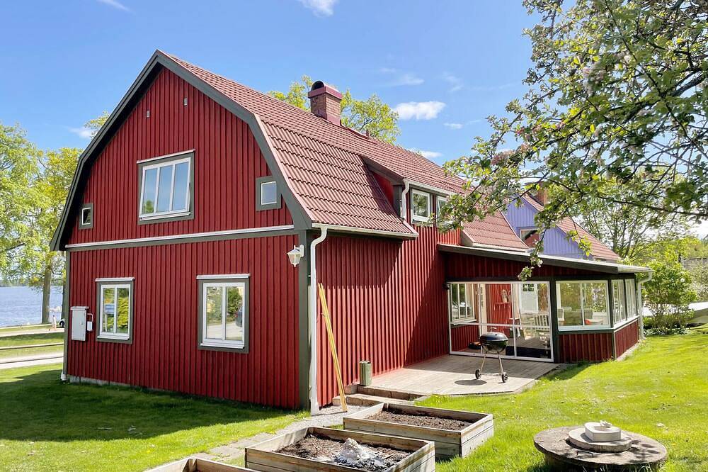 Schönes Ferienhaus mit Blick auf den See Åsnen in Hulevik, Lönashult | Se06056 in Asnen