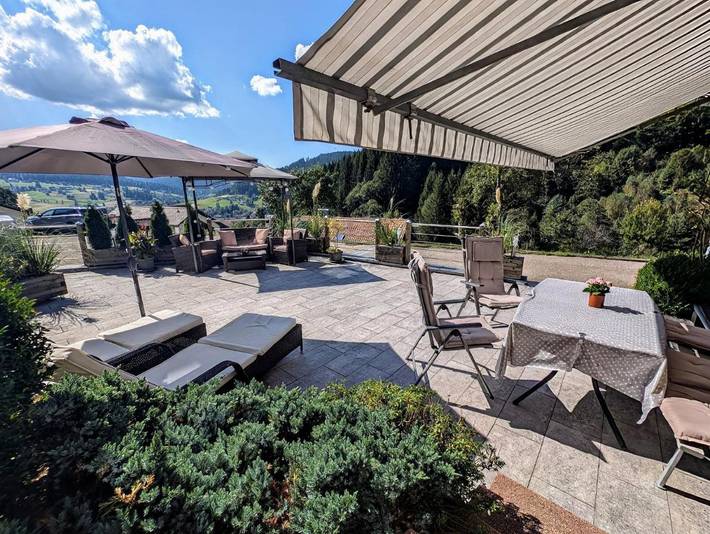 Ferienwohnung für 3 Personen, mit Terrasse und Garten sowie Ausblick