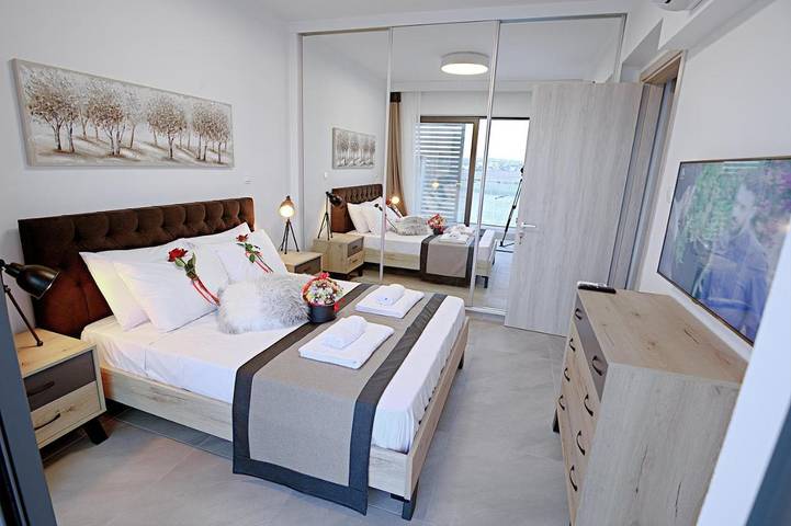 Appartement de vacances pour 4 personnes, avec jardin ainsi que piscine et vue