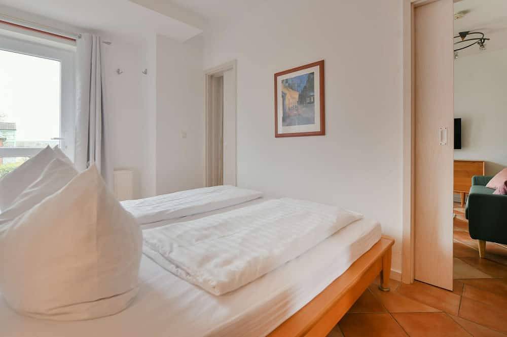 Ganze Wohnung, Komfortable Ferienwohnung mit Seeblick und Wintergarten im Ferienpark Seedorf in Seedorf (Sellin), Sellin