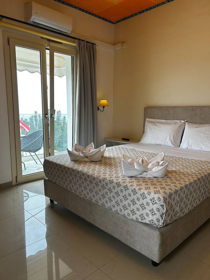 Appartement de vacances pour 5 personnes, avec jardin ainsi que vue sur l’océan et vue