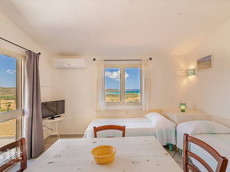 Tritt — Apartment in a holiday park for 6 people by the sea in Porto Taverna in Lu Nibbareddu, Loiri Porto San Paolo