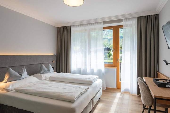 Ferienhaus für 2 Personen, mit Whirlpool und Sauna sowie Balkon und Garten