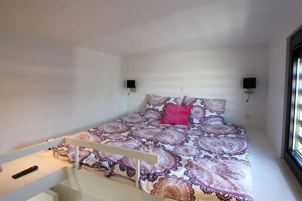 Chalet mit 2 Schlafzimmern und einer Terrasse in Holländische Küste