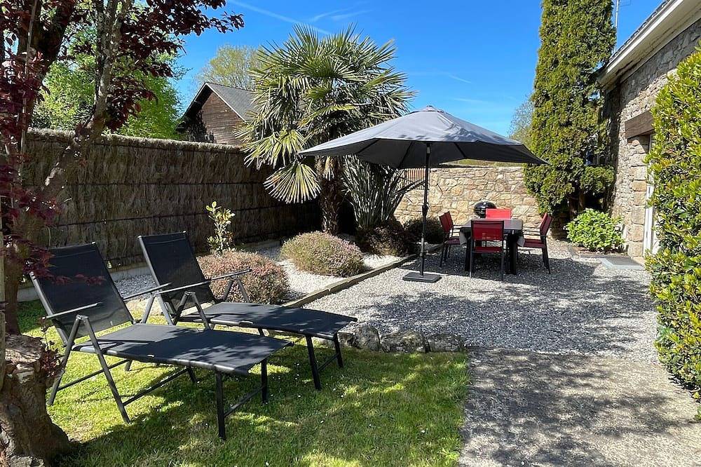 Gîte Charmant avec Cheminée, Jardin Clos et Equipements Bébé à Proximité de la Côte in Saint-Molf, Région de Saint-Nazaire
