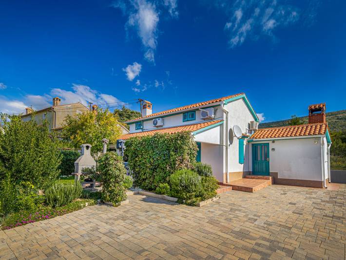 Ferienhaus für 4 Personen, mit Terrasse und Garten