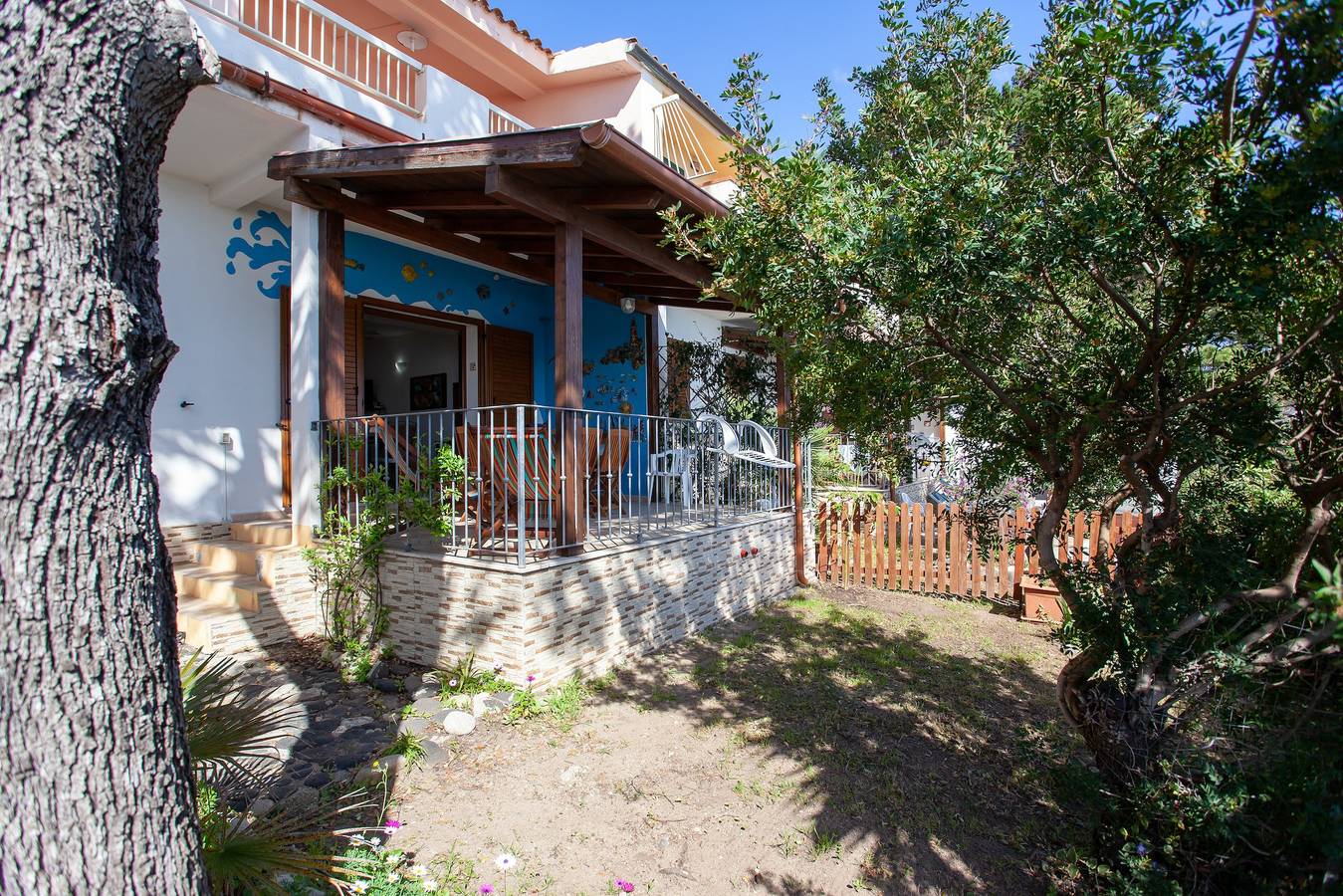 Casa vacanze "Casa sulla Spiaggia 1" con vista mare, terrazze e giardino in Sas Linnas Siccas, Orosei