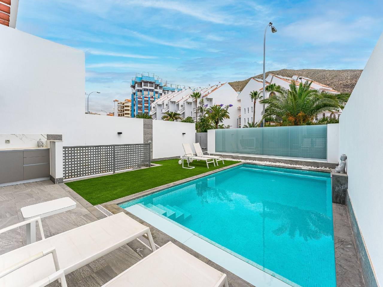 Villa Los Cristianos Deluxe | Prime Location |  Private Heated Pool with Waterfall | Outdoor Dining & Bbq in Los Cristianos, Arona