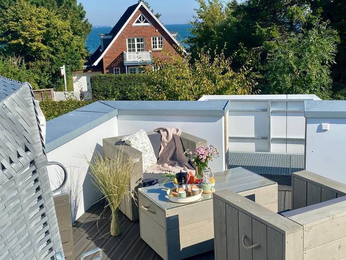 Ferienwohnung für 4 Personen, mit Terrasse und Garten sowie Sauna und Seeblick in Bockholm