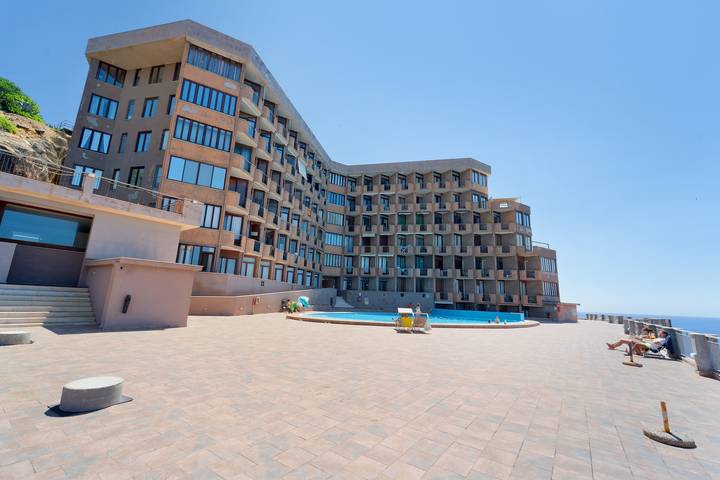 Appartement entier, Appartement 'Casa Aldo' avec vue sur la montagne, piscine partagée et balcon in Teulada (Italie), Province de Cagliari