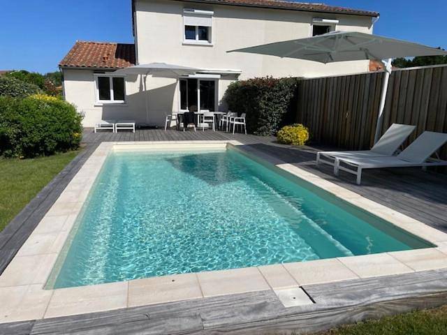Location de vacances pour 6 personnes, avec piscine ainsi que vue et terrasse dans Golf Blue Green Gujan