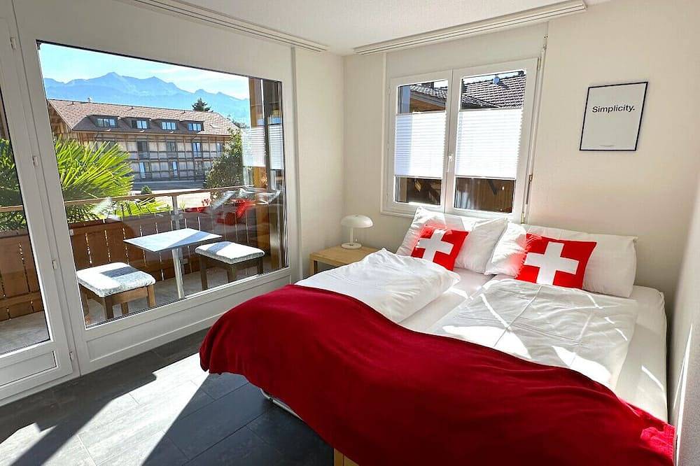 Geheel appartement, Swisshut Stunning Views Alps & Lake - Apart. Innerdorf in Sigriswil, Meer van Thun