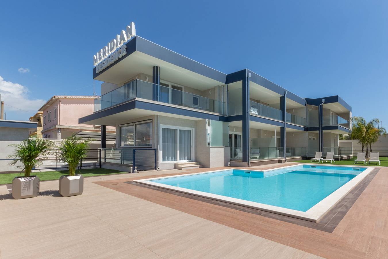 Entire apartment, Apartment "Residence Meridian Unità 4" Near the Beach with Mountain View, Pool, A/C, Wi-Fi & Balcony in Villa San Pietro, Cagliari Province