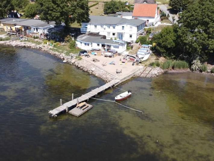 Ferienwohnung für 2 Personen, mit Seeblick und Garten, kinderfreundlich in Alt Reddevitz