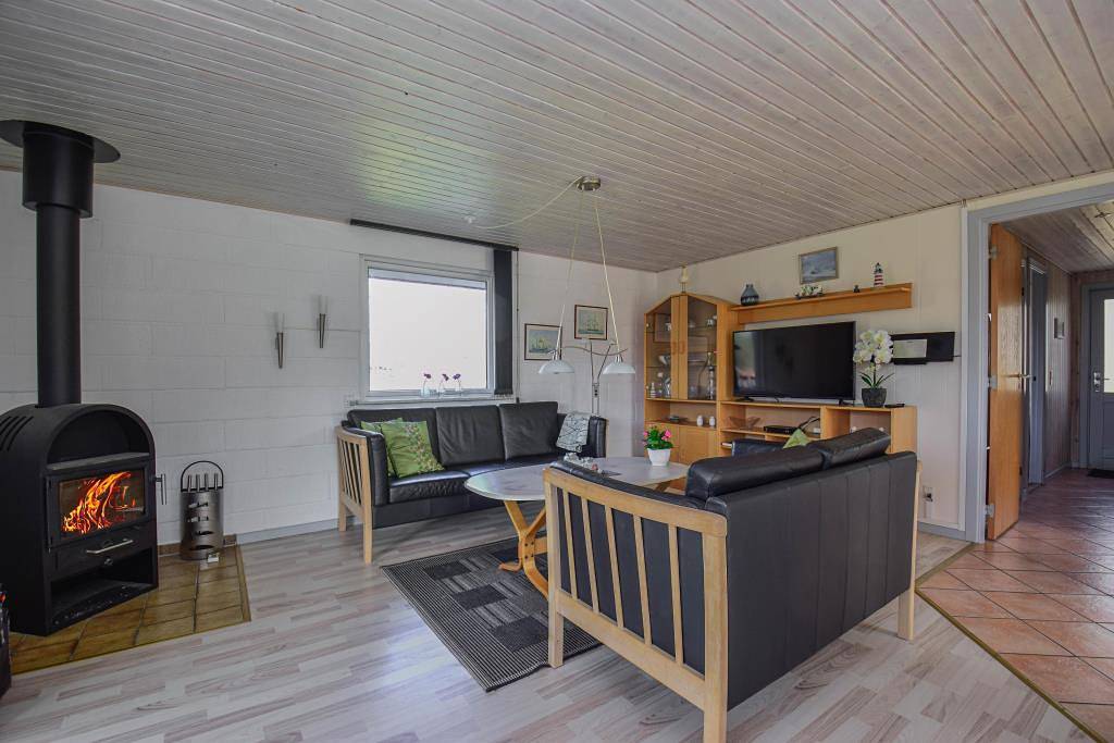 Gemütliches Ferienhaus mit Sauna, Schaukel und Kaminofen in Nørhede Vest, Ulfborg