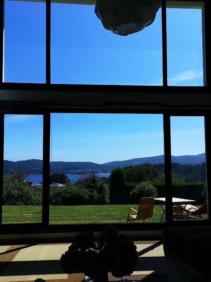 Chalet para 8 personas, con vistas y jardín, Se admiten mascotas en Mariña Occidental