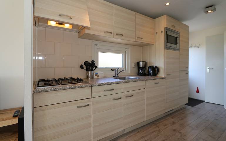 Casa vacanza per 4 persone con giardino in Costa Olandese