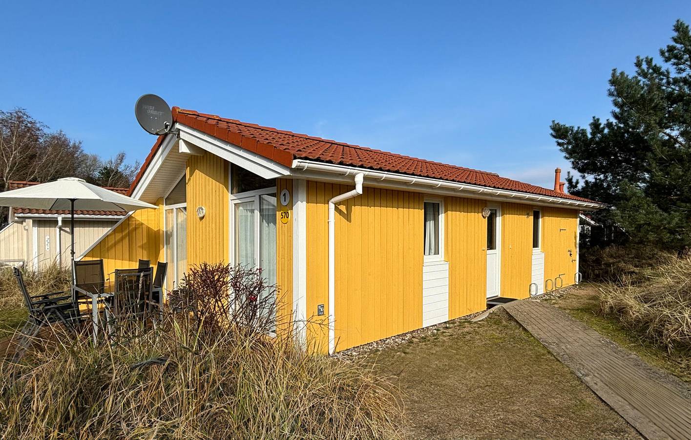 Rückzugsort am Strand: WiFi, Parkplatz, Terrasse & Küche in Priwall, Lübeck