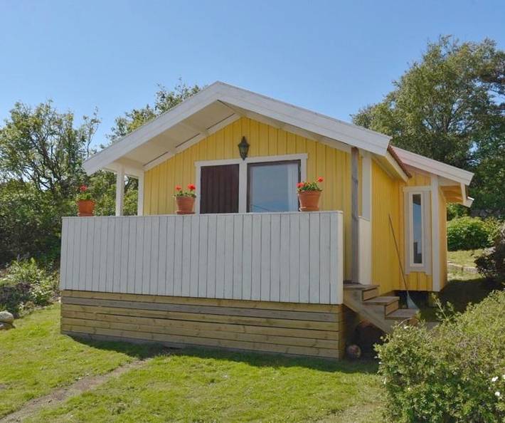 Ferienhaus für 2 Personen, mit Terrasse und Garten sowie Seeblick und Ausblick in Hamburgsund