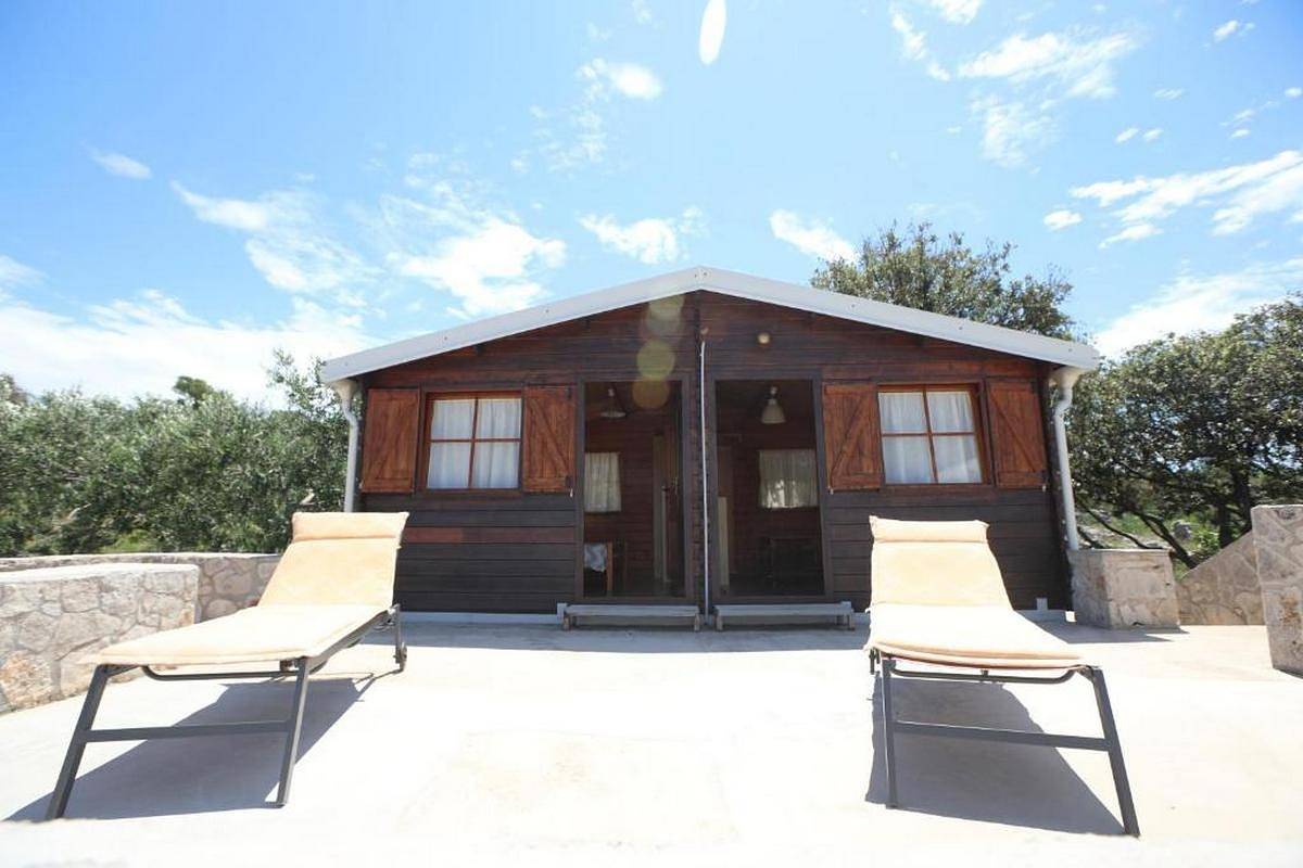 2-Zimmer-Haus mit Terrasse und Meerblick Bucht Mikavica, Žirje K-22367 in Dalmatinische Inseln