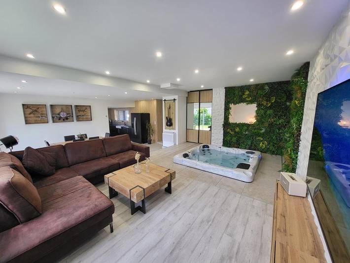 Appartement de vacances pour 2 personnes, avec terrasse ainsi que jardin et jacuzzi
