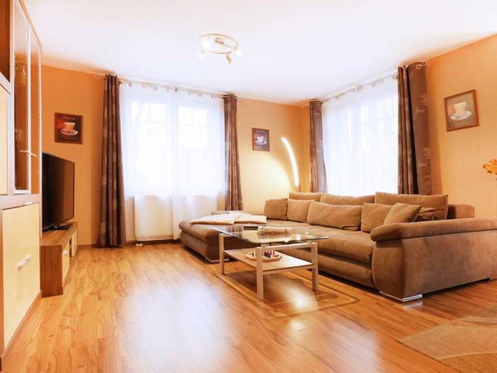 Ferienwohnung für 4 Personen, mit Terrasse und Garten sowie Sauna in Groß Schwansee