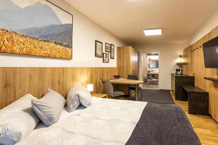 Ferienwohnung für 2 Personen, mit Terrasse und Ausblick sowie Garten
