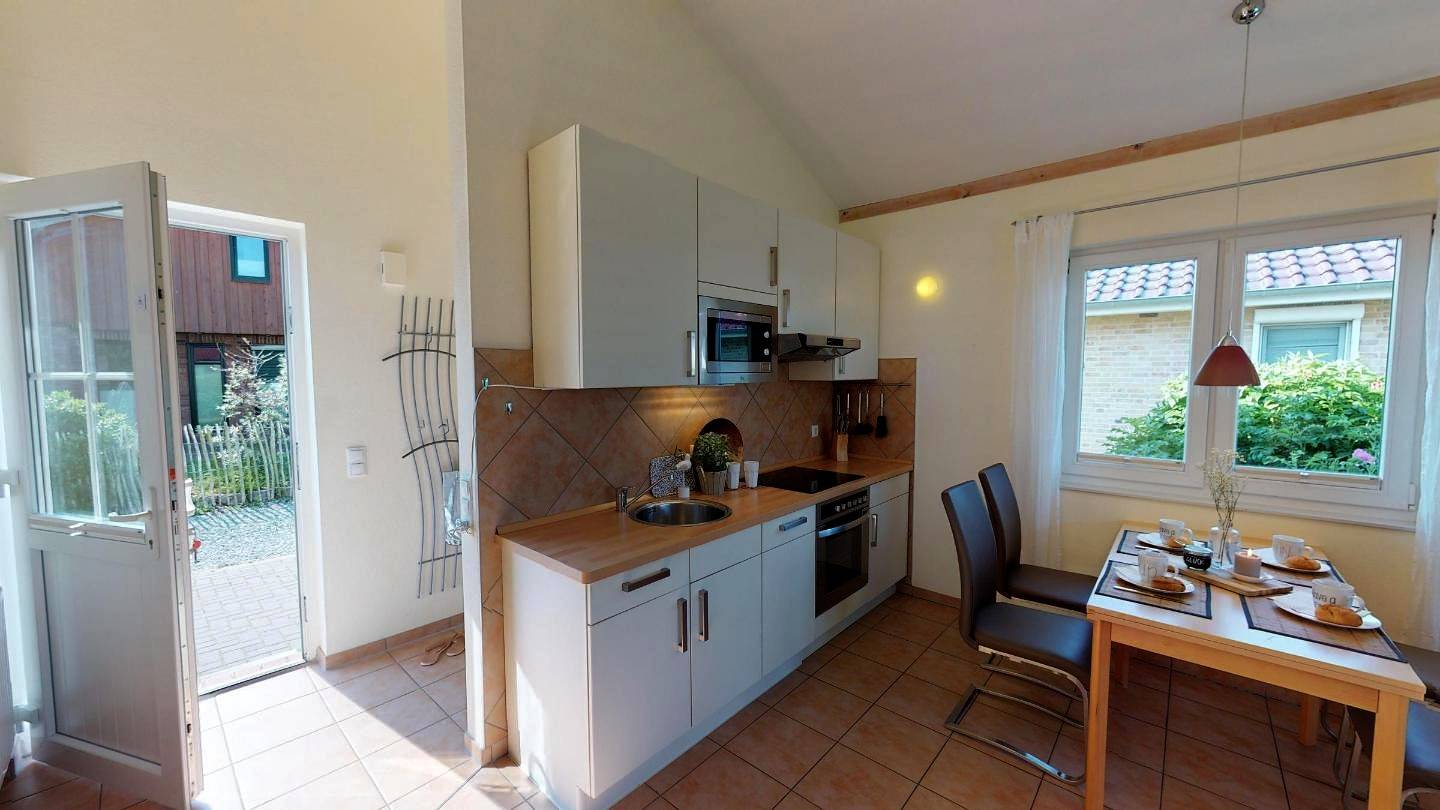 Helles 60 m² Ferienhaus für 4 Personen und Hund mit Garten, Strandkorb und Kamin in Südstrand Pelzerhaken, Ostholstein