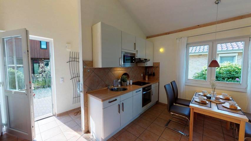 Helles 60 m² Ferienhaus für 4 Personen und Hund mit Garten, Strandkorb und Kamin in Südstrand Pelzerhaken, Ostholstein