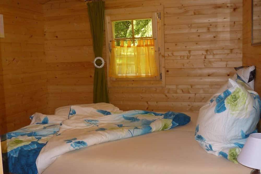 Holz-Blockhaus für vier Personen mit Terrasse in Beltheim, Hunsrück