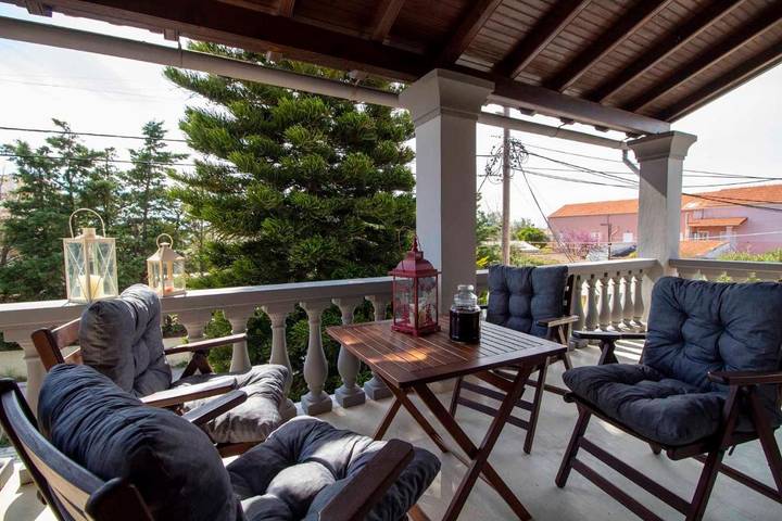 Vakantiewoning voor 4 personen, with Balkon and Terras as well as Tuin and Uitzicht in Acharavi